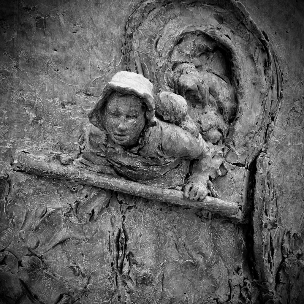 Sculpture at Martin's Cove, Wyoming, depicting a Mormon Pioneer woman pulling a handcart.